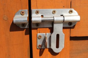 Latch-operated doors that raccoon can open